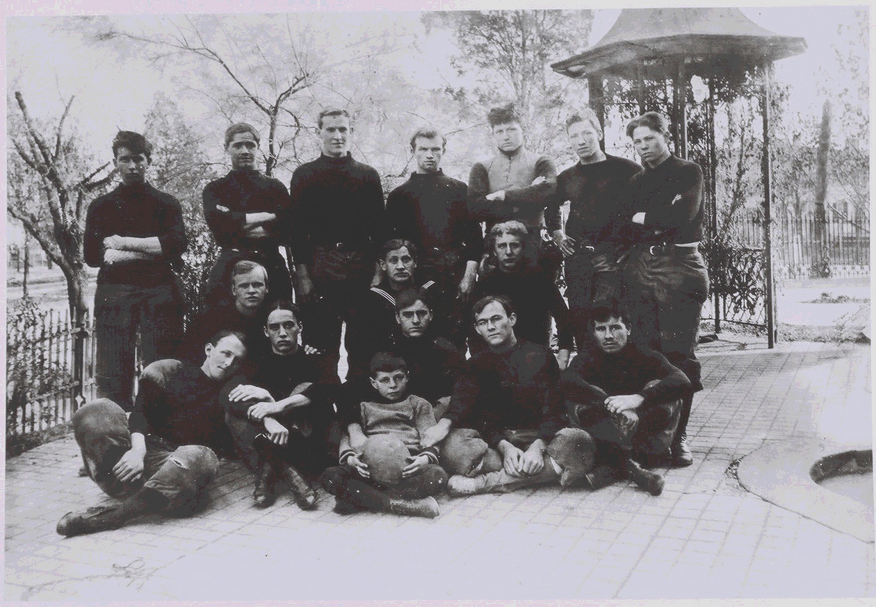 Undated photo of Hospital Corp Training School students in front of the well cover on the Northeast corner of the property