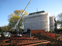 Miscellaneous--Stair elements being lifted into building through the elevator shaft - November 1, 2010