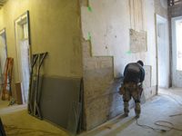 First Floor--Central hall looking south--installing screening for brown coat plaster - January 20, 2011