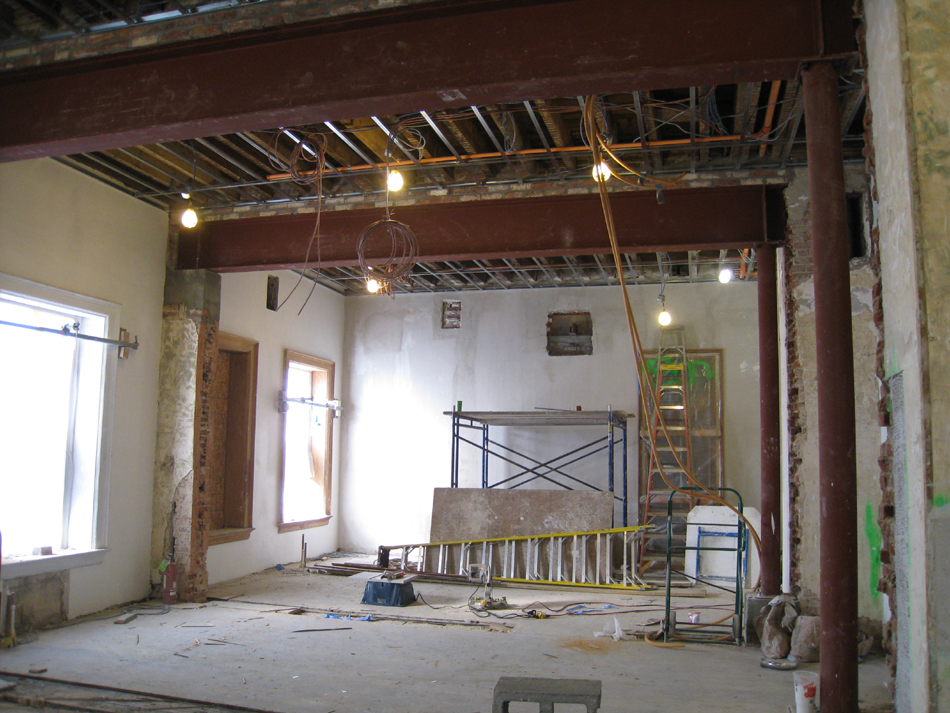 Second Floor--Large central room with large I-beams and finished plaster, with columns in place looking west - January 20, 2011