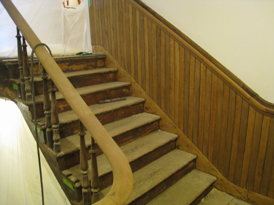 First Floor--Sanded railing for the central staircase (note the two alternating woods in the chair rail) - March 14, 2011