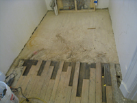 Second Floor--West end of corridor--Overlay wood with original wood underneath - March 15, 2011