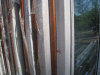 Carriage House--Detail of clear African Mahogany for addition--primed for outside, stained for inside - July 9, 2011