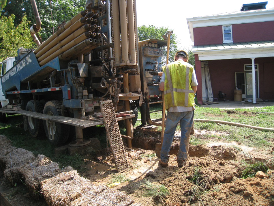 Geothermal drilling for HVAC systems on northwest corner,  Wells to go down about 350 feet