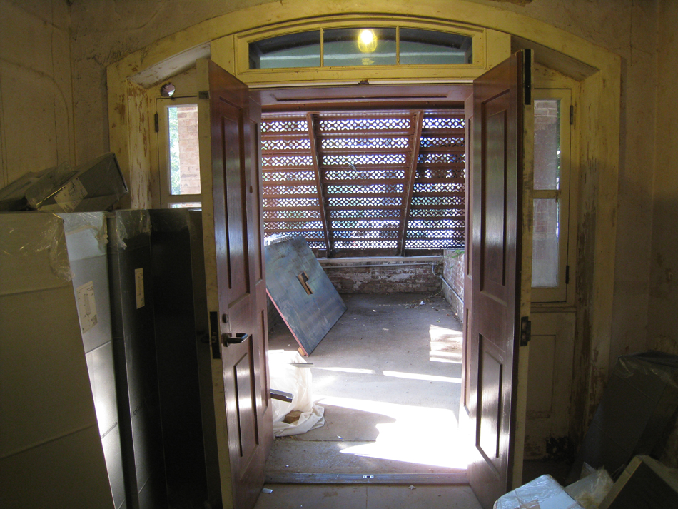 Ground Floor - looking out south door at iron stairway - September 8, 2010
