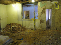 Ground Floor (Basement) - looking out south door at iron stairway - September 8, 2010