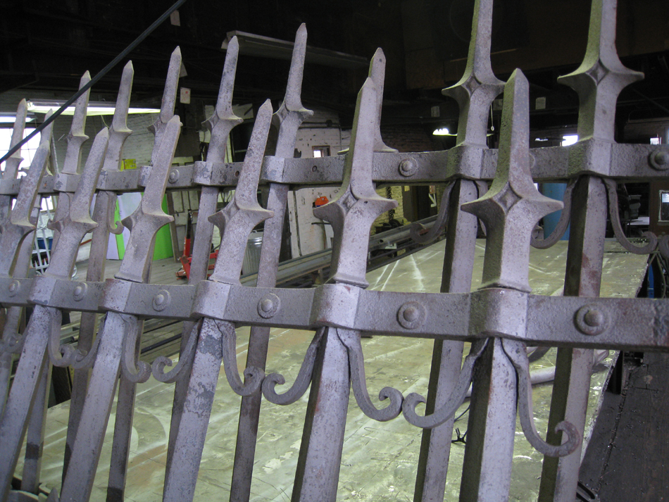 Fence - at G. Krug and Sons - detail of fillets (scrolls) and top spears after sandblasting.