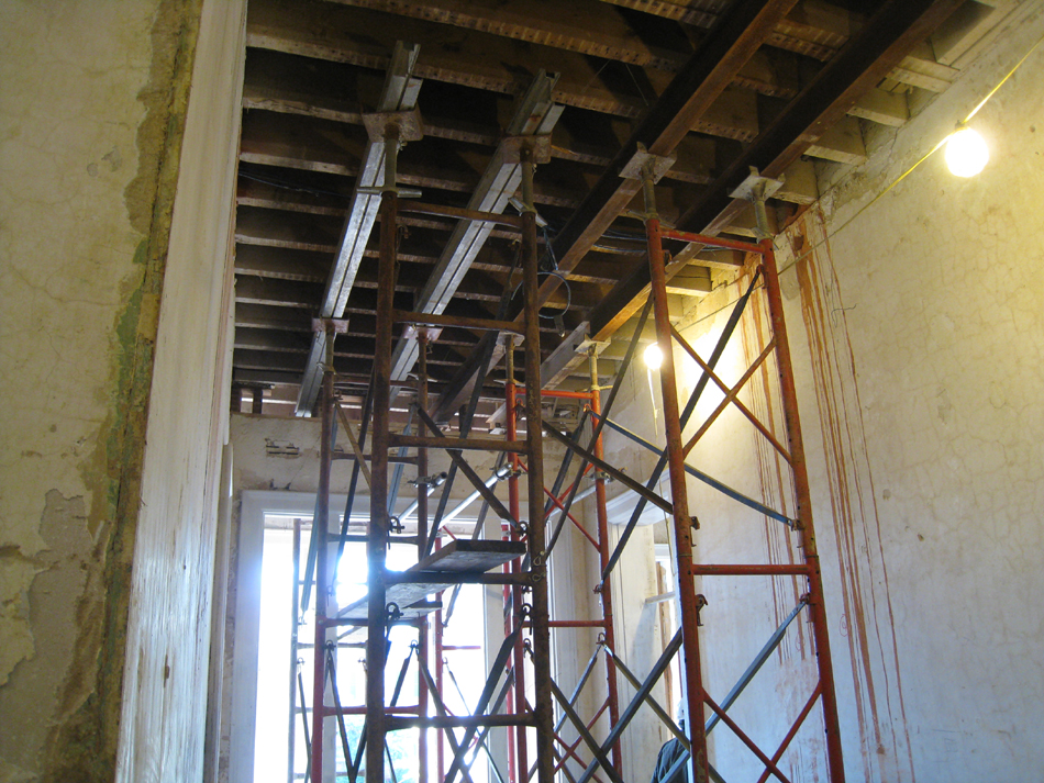 First Floor--Main corridor to south with shoring for removal of walls on second floor