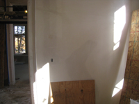 First Floor--Final skim coat for plaster in south east corner (north side) - November 17, 2010