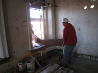 Second Floor--Lifting the parts for the east staircase into the building (through the west side corridor window) - November 19, 2010