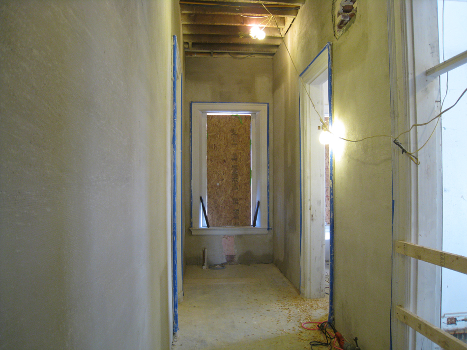First Floor--Encapsulating plaster complete in the east corridor (ready for skim coat)