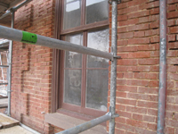 Elevation--Detail of south elevation just west of main door, showing preparation for repointing mortar - December 2, 2010