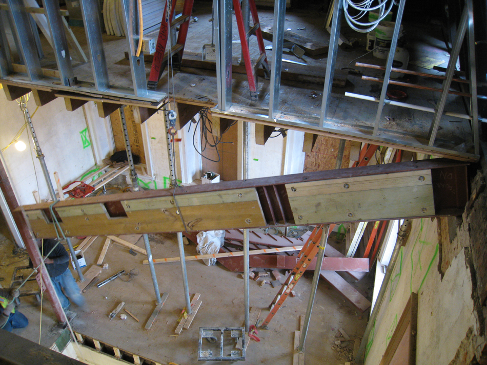Third Floor--Looking down east stairwell as beam is being raised into place - December 28, 2010