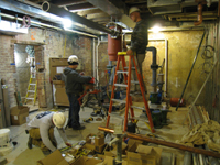 Ground Floor (Basement) --Installing HVAC equipment in northeast room - January 7, 2011
