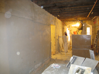 Ground Floor (Basement) --Corridor looking south to entrance--Brown coat plaster - January 20, 2011