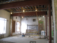 Second Floor--Large central room with large I-beams and finished plaster, with columns in place looking west - January 20, 2011