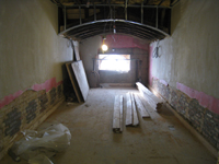 Third Floor--Central room with exposed brick (where bracing was for second floor walls) - January 20, 2011