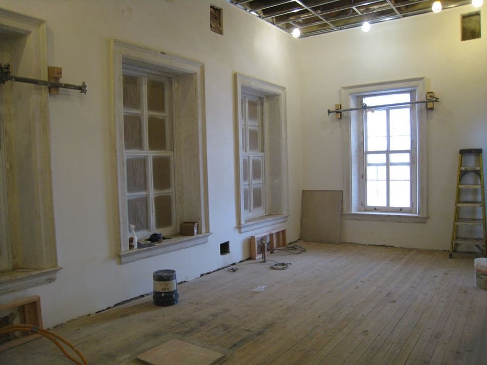 Second Floor-Southeast corner room showing newly installed restored windows and sanded floors - February 1, 2011