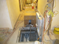 Geothermal/HVAC--Working on the geothermal pipes in the chase - March 3, 2011