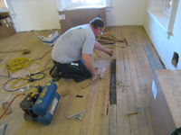 Second Floor--Floor repair before final sanding and sealing, northwest corner room - March 3, 2011