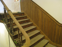 First Floor--Sanded railing for the central staircase (note the two alternating woods in the chair rail) - March 15, 2011