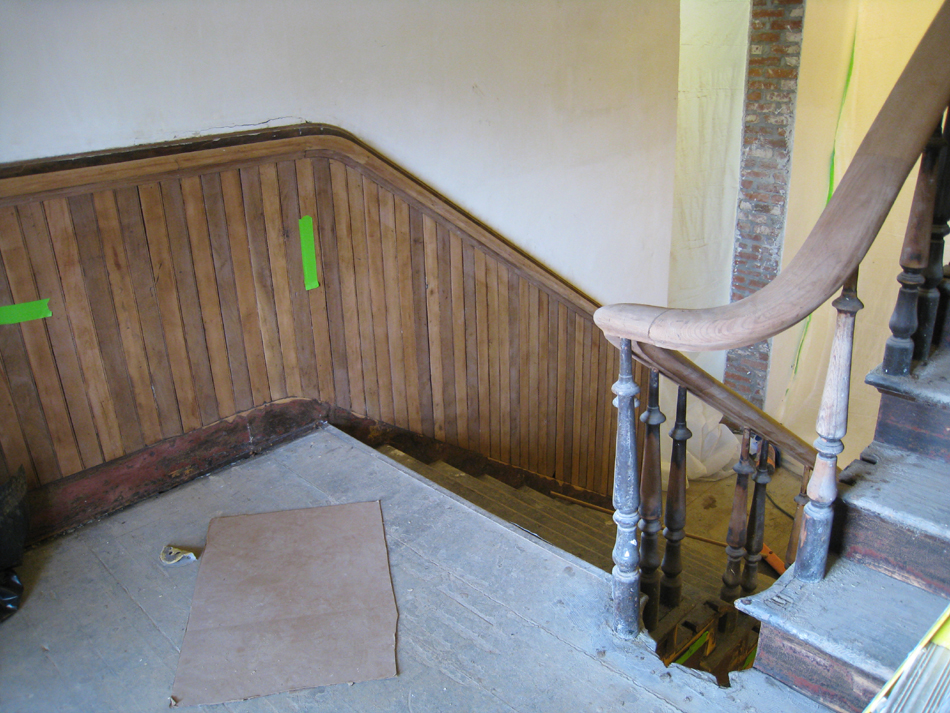 Second Floor--Sanded railing for the central staircase (note the two alternating woods in the chair rail) - March 14, 2011