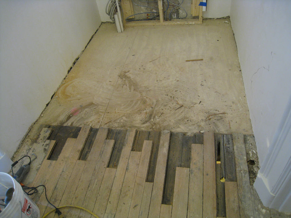 Second Floor--West end of corridor--Overlay wood with original wood underneath - March 14, 2011