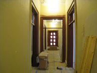 Second Floor--Looking east in the main corridor at newly painted window and door frames - April 9, 2011