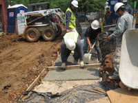 Grounds--Pouring concrete for sidewalk - June 10, 2011