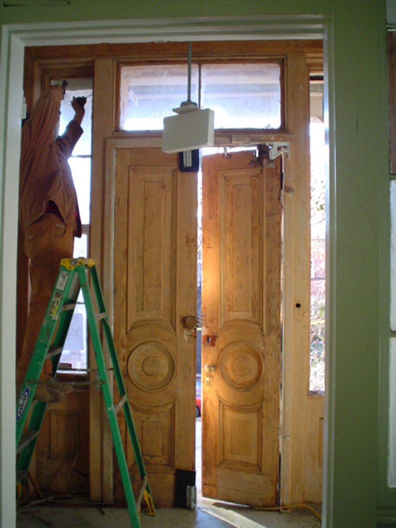 Restoration of the doors on the south side of the building got underway during this past week.
