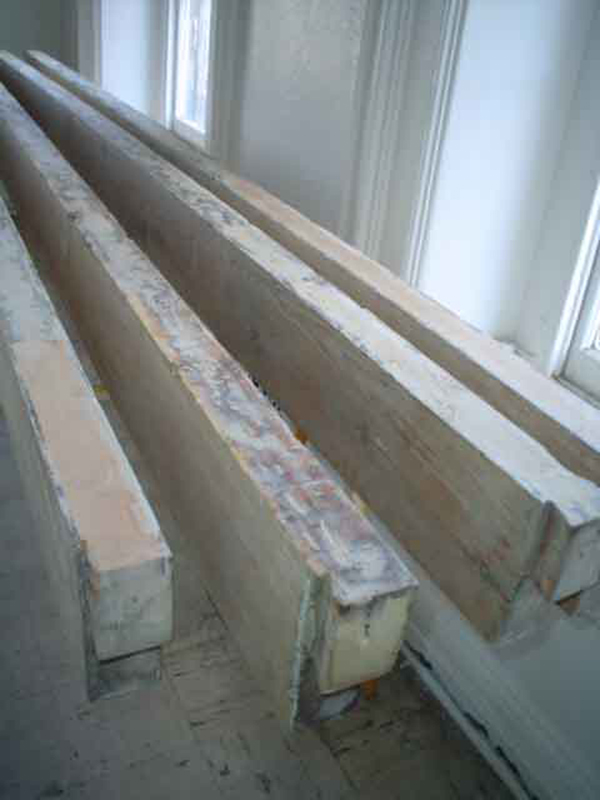 Restored joists are being primed and completed.